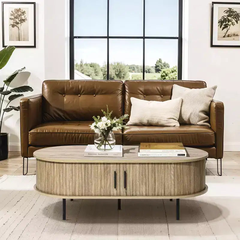 47" Oval Coffee Table with Sliding Door Storage, Mid Century Modern Fluted Design, Brown