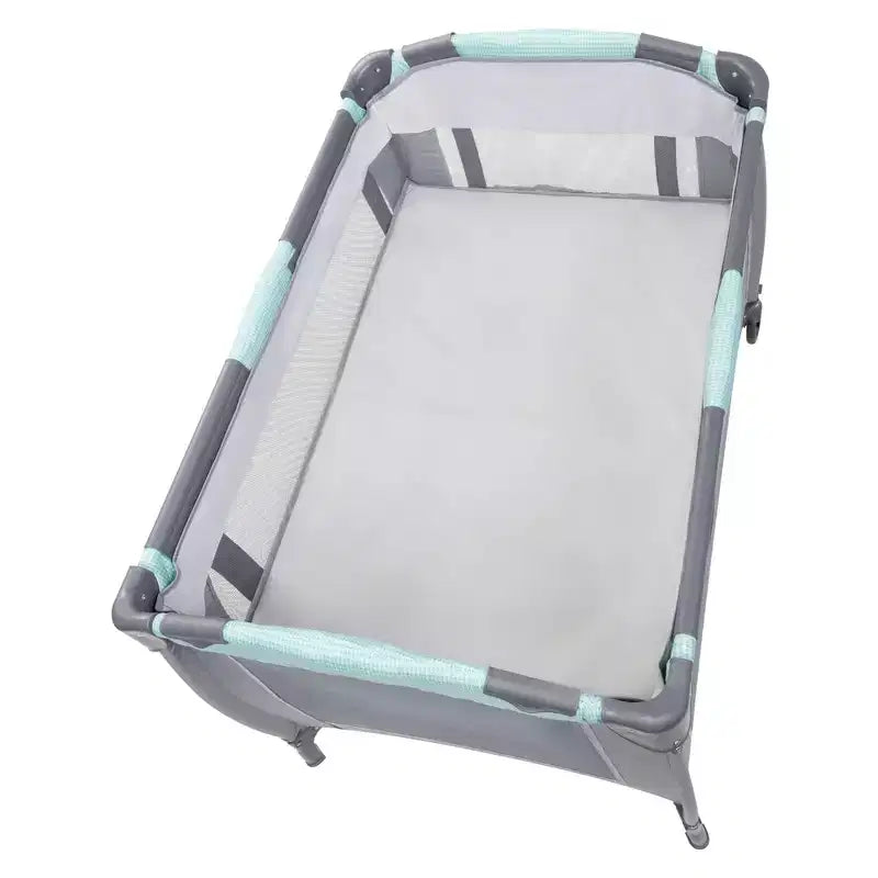 Nursery Center Playard with Rocking Cradle, Bassinet, and Changing Table